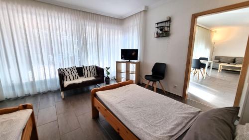 Ένα ή περισσότερα κρεβάτια σε δωμάτιο στο Ferienwohnung Mühlenbach