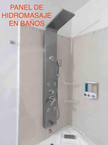 a bathroom with a shower and a toilet in it at Casa entera Alberca en Acapulco Diamante in Acapulco
