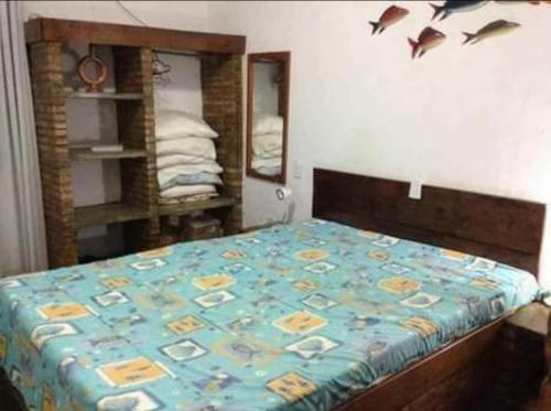 En eller flere senge i et værelse på Casa Olivença