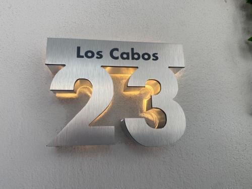 a sign for the los cados sign on a wall at Casa Castillo in Mexico City