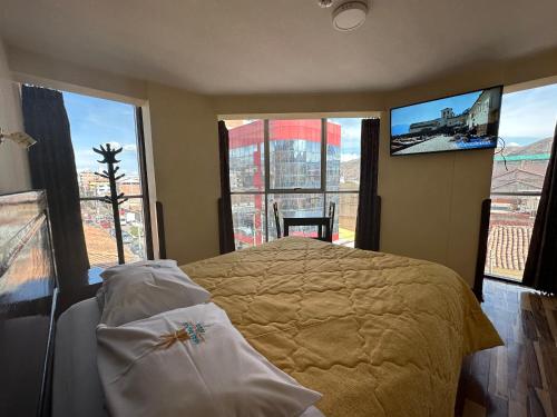 Ένα ή περισσότερα κρεβάτια σε δωμάτιο στο Hotel Inka Palace Huayna Ccapac Cusco