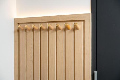 a close up of a wooden garage door at Little Charlie Hotel in New York