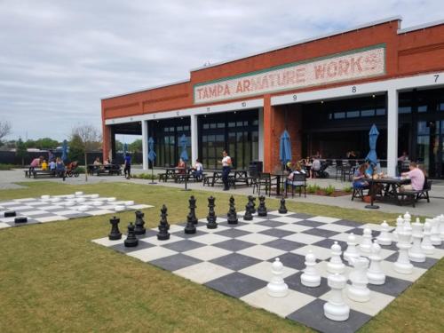 a giant chess board in front of a building at Tampa Tropical-10 Min to Airport in Tampa