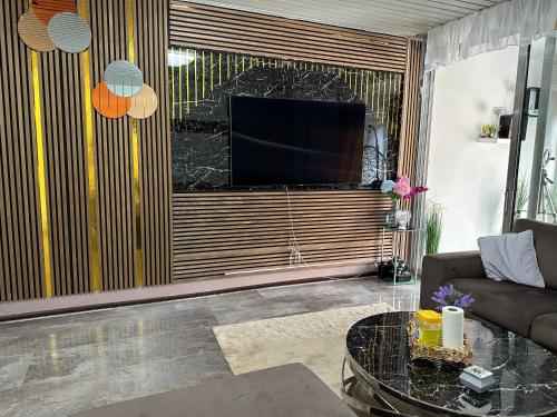 TV a/nebo společenská místnost v ubytování Wow
