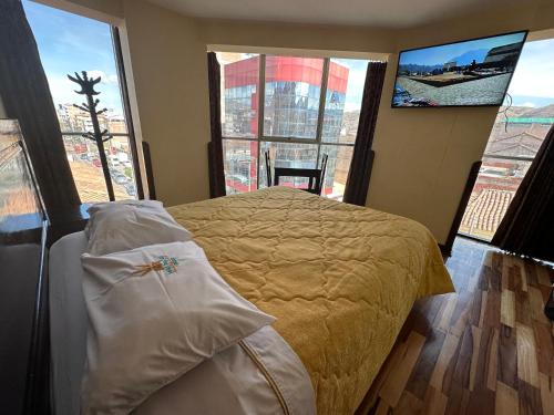 Ένα ή περισσότερα κρεβάτια σε δωμάτιο στο Hotel Inka Palace Huayna Ccapac Cusco