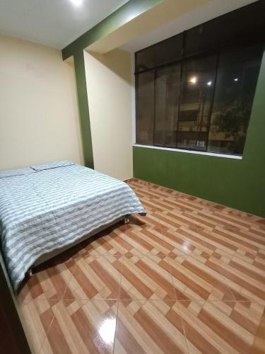 Кровать или кровати в номере O'cala House 2.0
