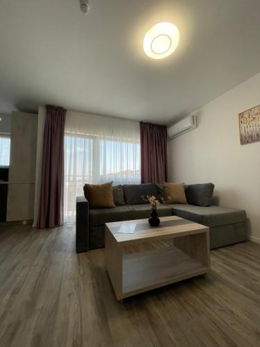 Гостиная зона в Comfort & Luxury Apartaments PNMresidence