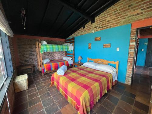 Ein Bett oder Betten in einem Zimmer der Unterkunft Refugio Explora Verde