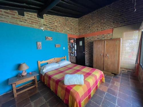 Ein Bett oder Betten in einem Zimmer der Unterkunft Refugio Explora Verde