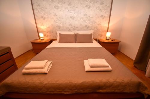 Apartments and rooms with parking space Palit, Rab - 21755