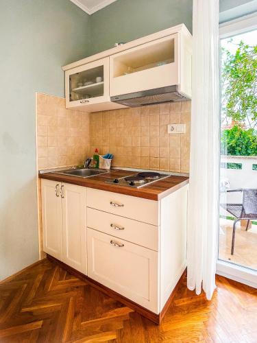 Apartments and rooms with parking space Palit, Rab - 21755