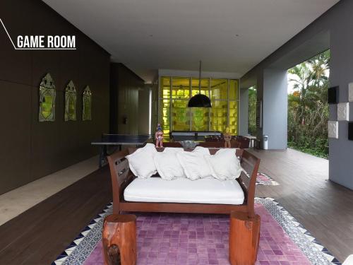 a living room with a couch and a table at Icon Vallarta Beach front By Bamboo Skylife in Puerto Vallarta