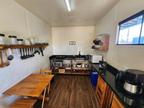 Una cocina o zona de cocina en Vila Leal Hospedaria