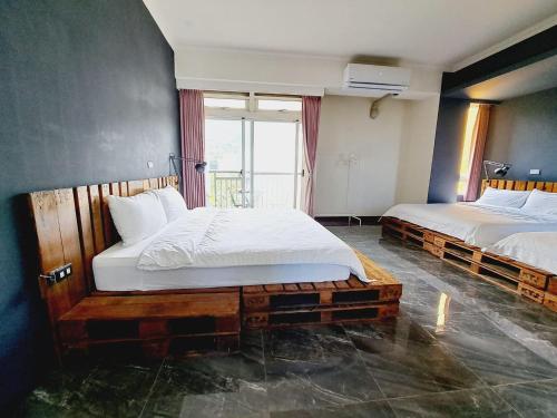 Postel nebo postele na pokoji v ubytování Ayo Socks Homestay
