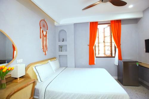 Кровать или кровати в номере Rova Hotel Phú Quốc