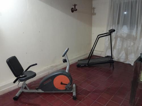 a room with two exercise bikes in a room at Centro in Mercedes