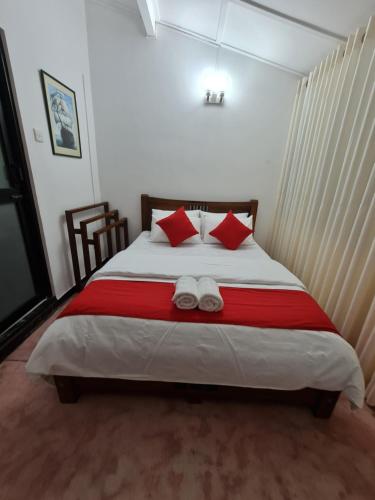 Ein Bett oder Betten in einem Zimmer der Unterkunft Hello Kandy Homestay