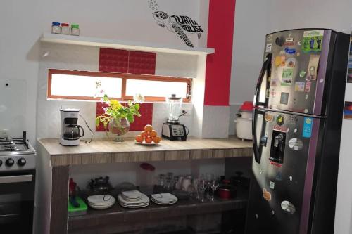 Кухня или мини-кухня в Tortuga House
