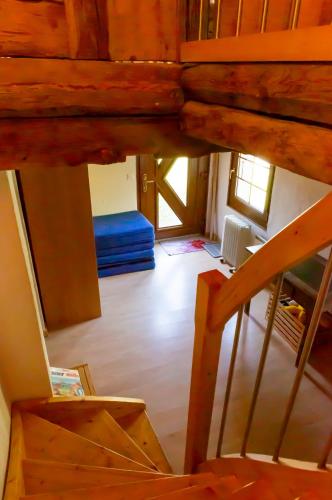 an overhead view of a room with a staircase and a house at Chalet Edelweiss in Hérémence