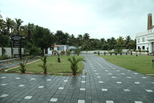 Jardín al aire libre en MARIYALAYAM MUNROE ISLAND RESIDENCY
