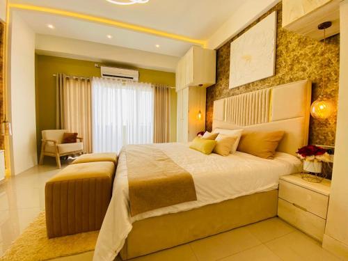 Postel nebo postele na pokoji v ubytování Ocean Breeze - UDAYA Luxury Apartments