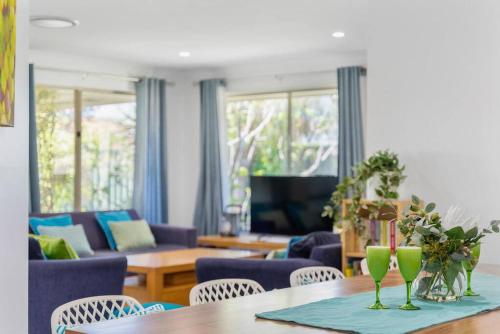 a living room with a table and chairs at Busselton Family Holiday House - by the Bay in Geographe