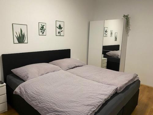 Postel nebo postele na pokoji v ubytování Paky Appartements 00322