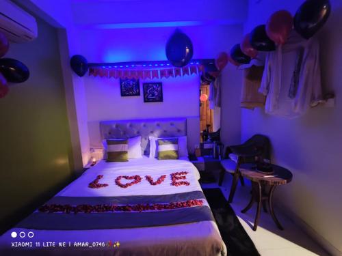 Postel nebo postele na pokoji v ubytování Hotel Prabhat