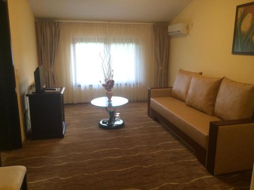 Χώρος καθιστικού στο Hotel Astoria