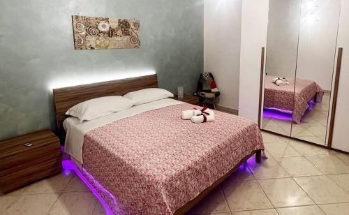 Vuode tai vuoteita majoituspaikassa B&B Le Cinque Porte