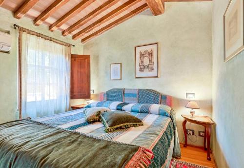 a bedroom with a large bed in a room at Villa Experience - Relais Il Termine Elba in Rio Marina