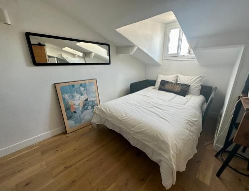 Кровать или кровати в номере Beau studio au cœur de Nice