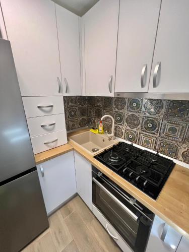 Dapur atau dapur kecil di Boby s Studio with Free Parking