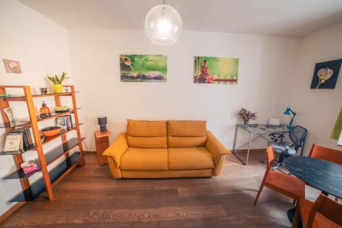 a living room with a couch and a table at Alghero, old town in Alghero