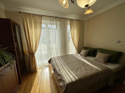 Ένα ή περισσότερα κρεβάτια σε δωμάτιο στο Apartment Julia in the center of Karlovy Vary