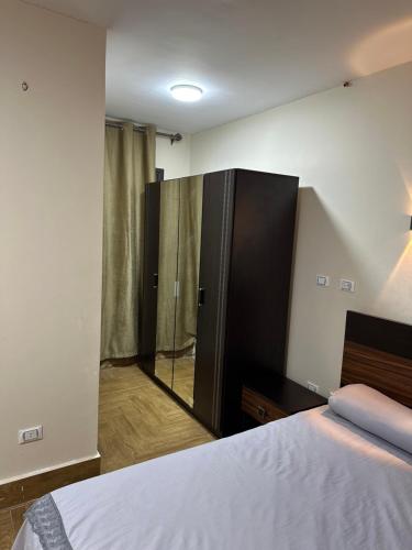เตียงในห้องที่ Nakhil properties
