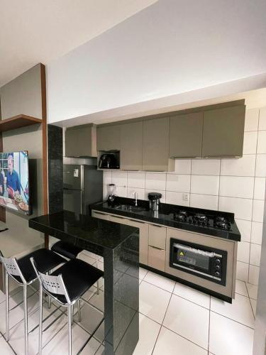 Dapur atau dapur kecil di Condomínio Colina