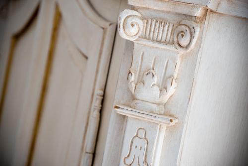 a door with a drawing of a man on it at Relais San Giacomo in Maiori