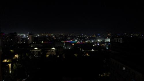 a view of a city at night with lights at APARTMENT - КВАРТИРА NEW in Tashkent