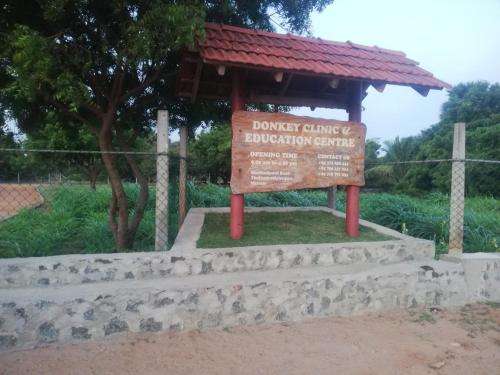 a sign at the entrance to a dower clinic and observation centre at Donkey clinic and education center in Mannar