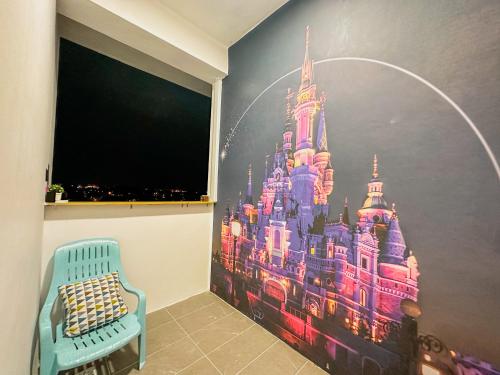 a room with a wall with a painting of a castle at Disneyland Theme DFB homestay 03 Gala City Armadale Residence in Kuching