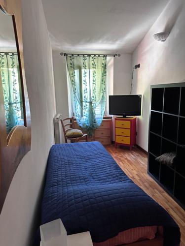 Postel nebo postele na pokoji v ubytování Casa Garfagnana