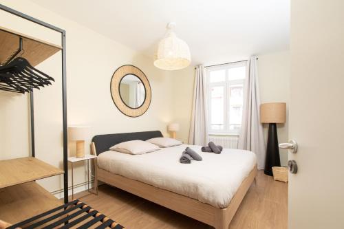 Katil atau katil-katil dalam bilik di Gîte LE VAUBAN