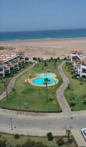 an aerial view of a resort on the beach at Appartement de vacances BERALMAR CHEZ HOUDA in Asilah