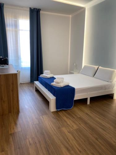 Postel nebo postele na pokoji v ubytování Maison Butera