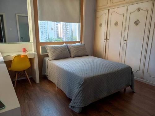 Cama ou camas em um quarto em Sweet Copacabana