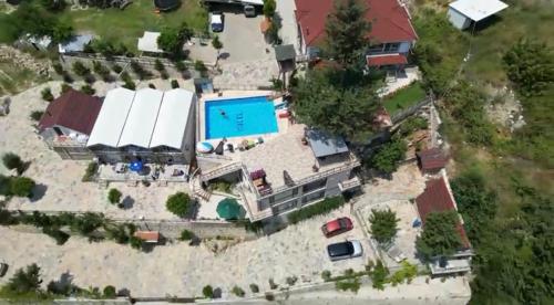 an aerial view of a house with a swimming pool at Gökdere Evleri in Antalya