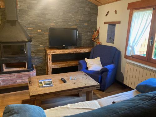 TV a/nebo společenská místnost v ubytování Casa Lueza
