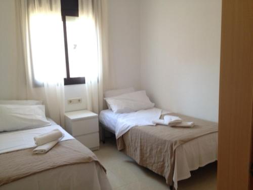 Posteľ alebo postele v izbe v ubytovaní Vicmar Home Apartment I