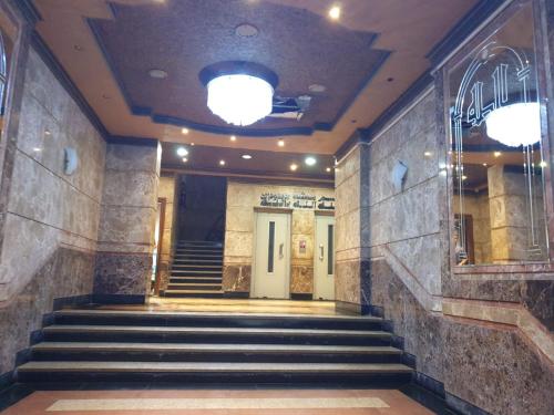 a hallway with stairs leading to a building at بيت الاحلام للسكن الراقي in Cairo